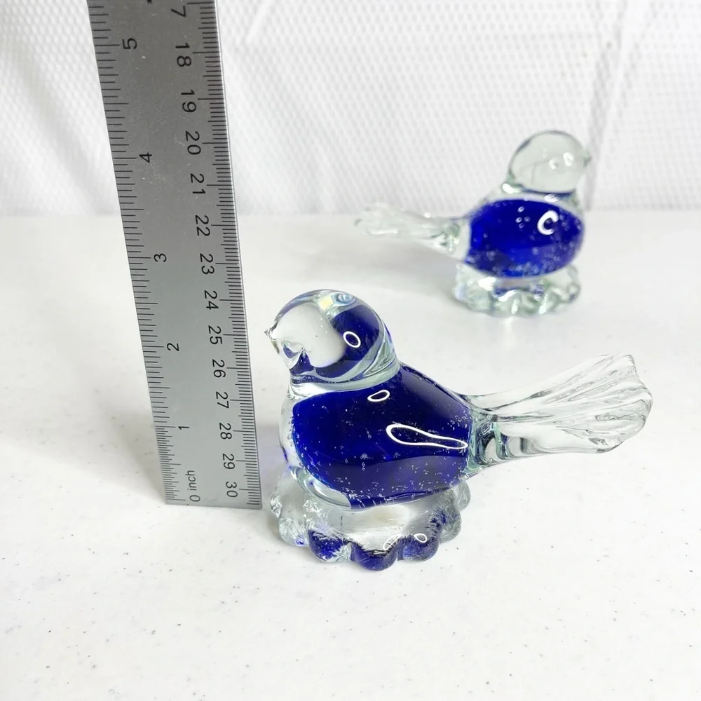 Vintage (2) small Snowflakes blue bird blown clear glass figurines.